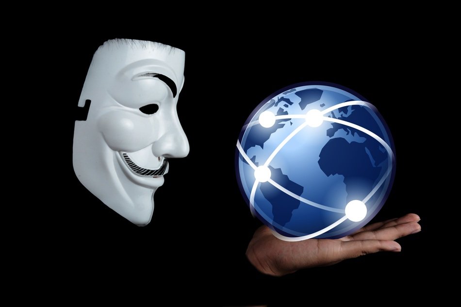mask mime holds ball in hand