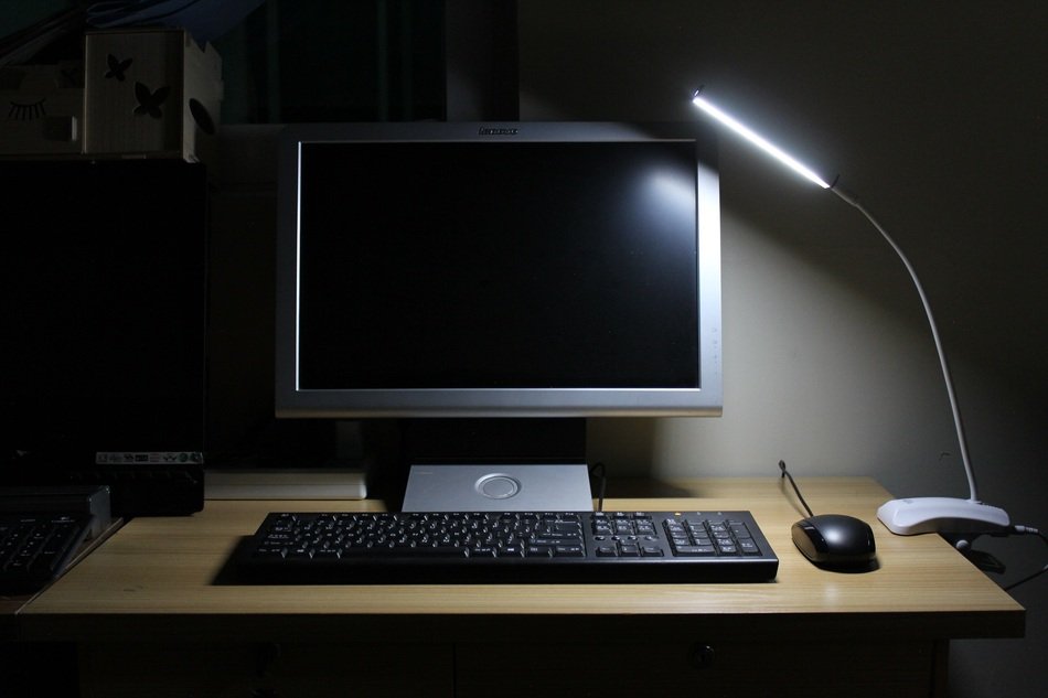 desktop computer and night lamp
