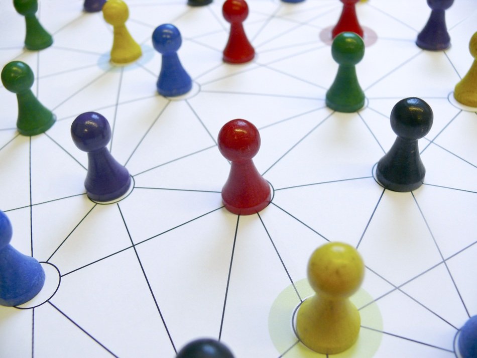multicolored figures connected by a network