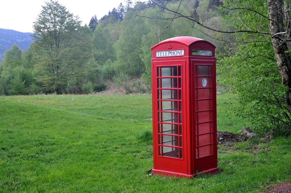 Red famous telephone box in the Vosges