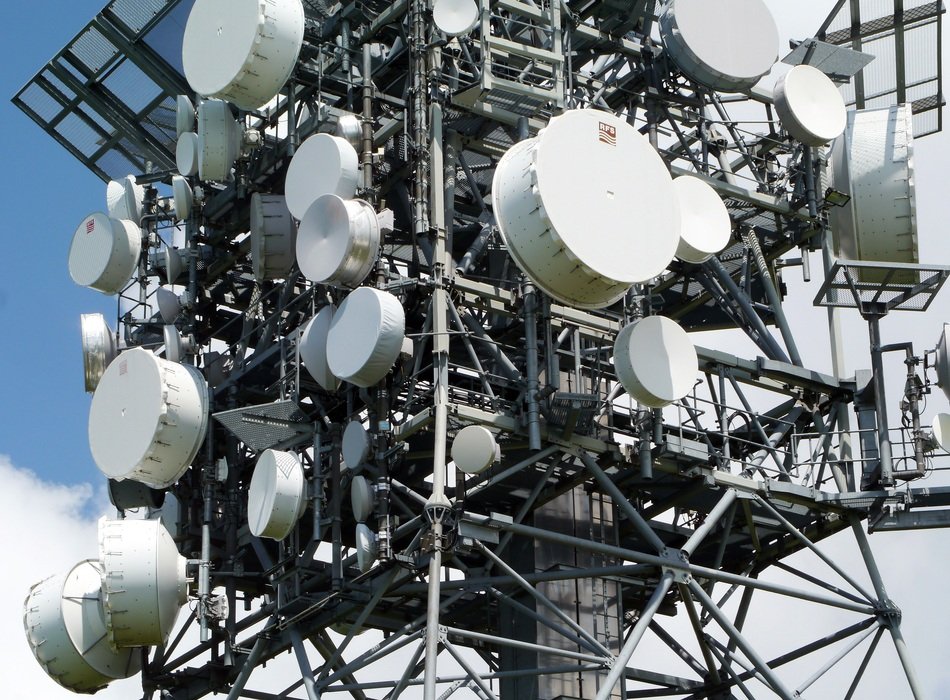 lot of Antennas on mast at sky