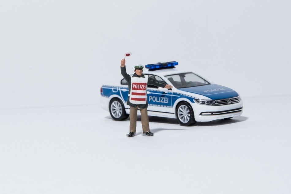 miniature of policeman and his car
