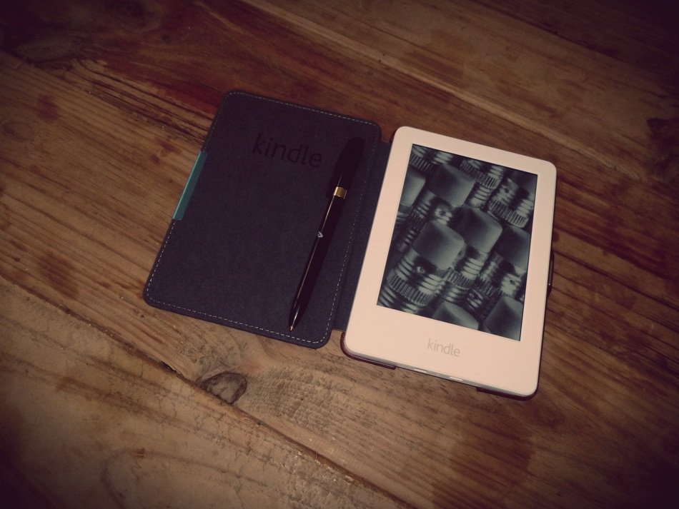 tablet in leather cover and pen
