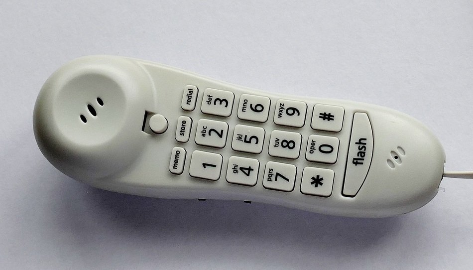 gray handset with buttons