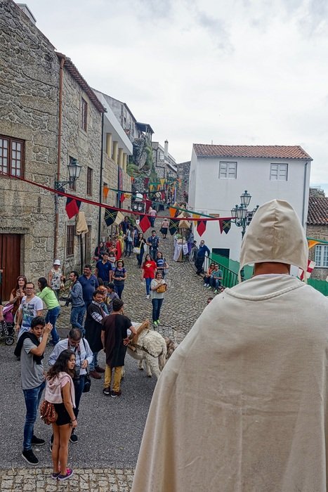 preacher in traditional clothes on the street