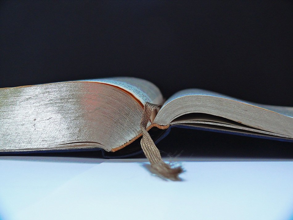 open bible with silver pages