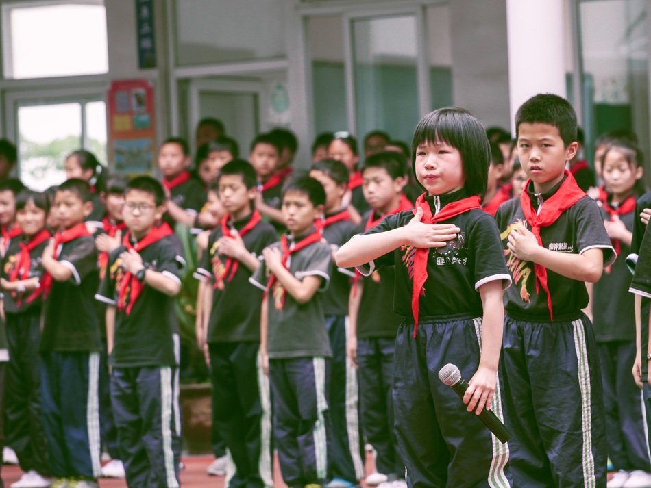 Asian children in red ties
