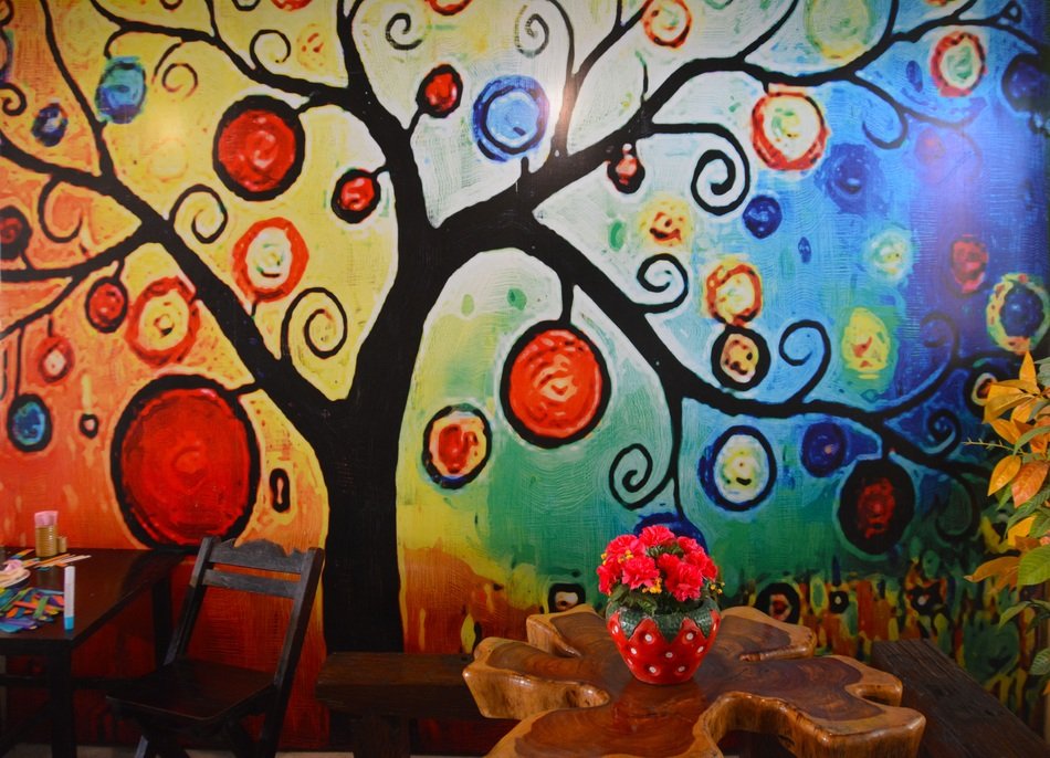 drawing of a tree on the wall in the playground