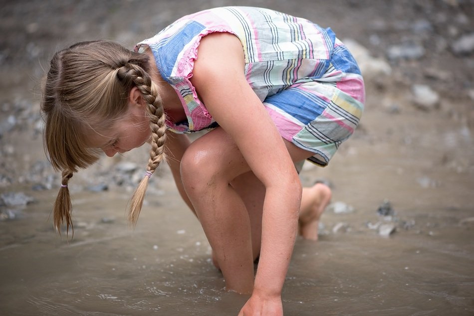 photo of girl in the creek