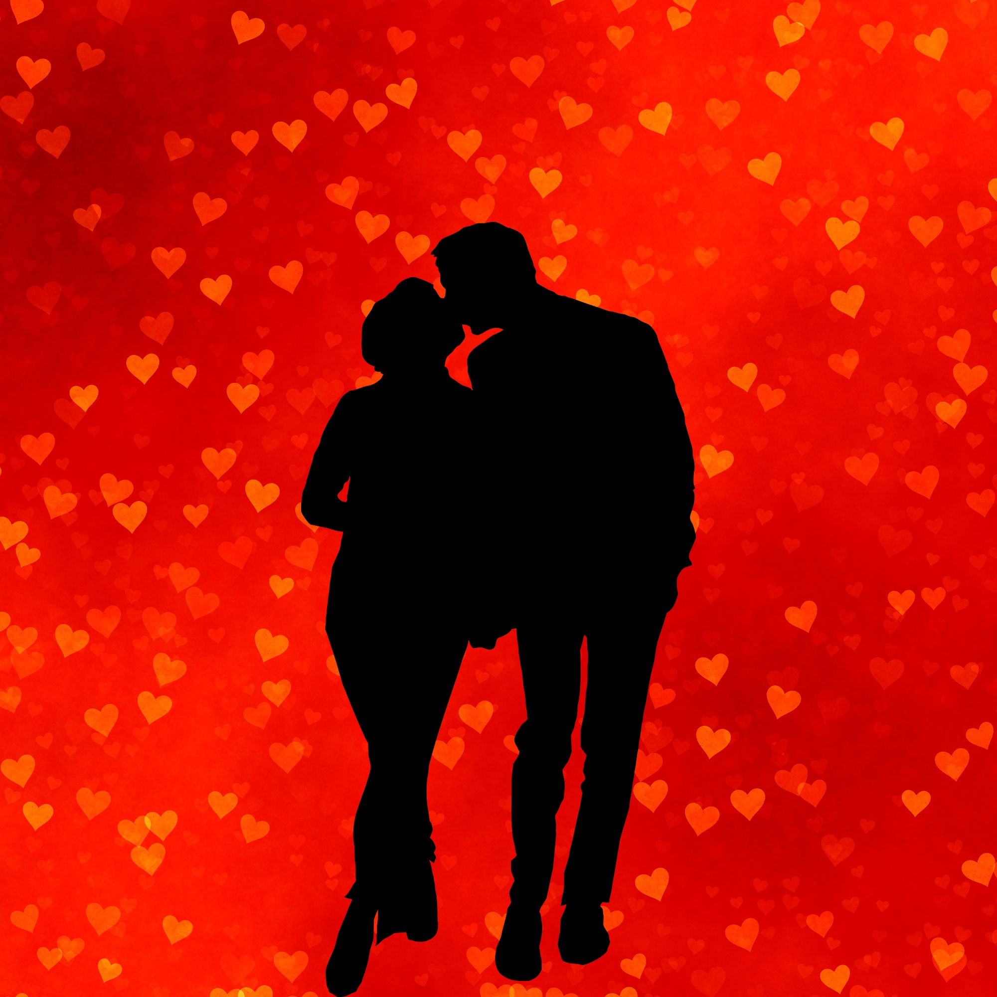 Black silhouette of kissing couple on the red background free image ...