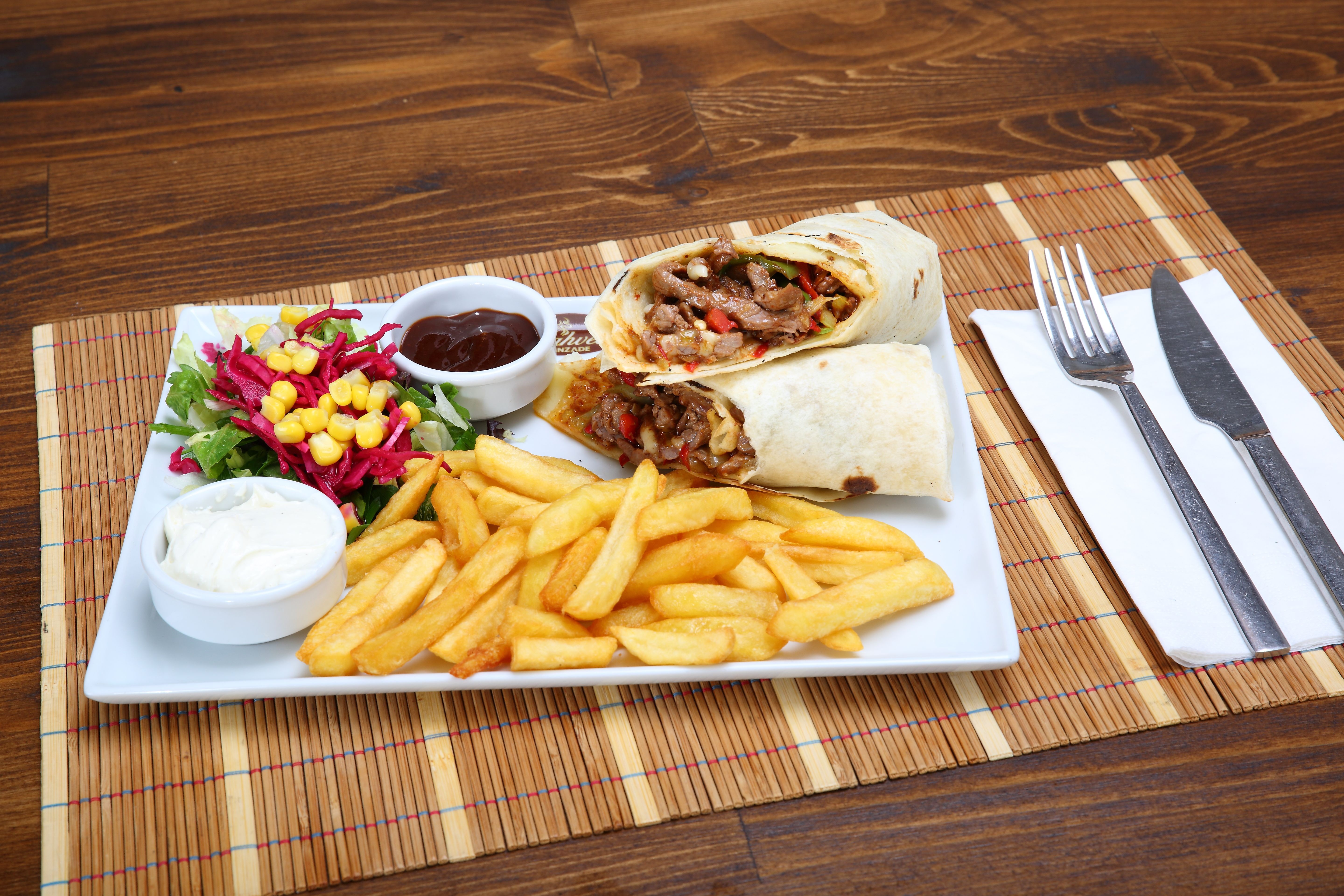 The table. Food on the Table. Food in Bowls on Table. Food portions on Table. Food on Table in the Kitchen.