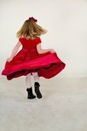 little girl in the red dress