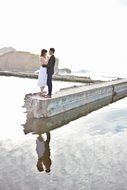 romantic couple near the water