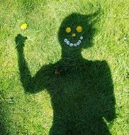 female shadow with Cheerful Smile on lawn