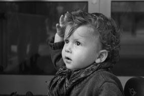black and white portrait of a little boy