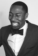 black and white portrait of a smiling african american