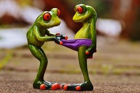 ceramic frog pulls off another ceramic figurine panties