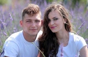 young couple in love among a lavender field