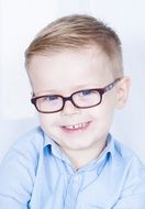 cute little boy in glasses