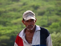 thoughtful elderly man outdoors