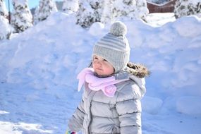happy little kid in the snow
