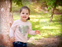 happy child in t-shirt with heart