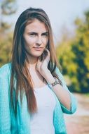 girl with a clock on her hand