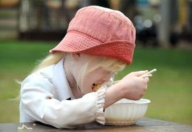 girl eating noodles