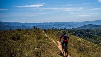 tourist on a bike in the mountains