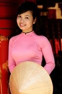 Vietnamese young woman in pink dress