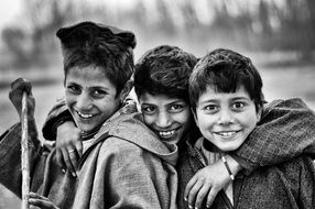 black and white photo of village boys