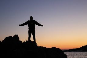Silhouette of the man under the sunset