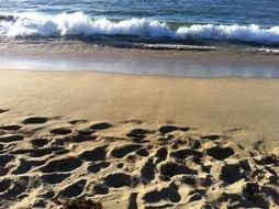 ocean waves and paradise sandy beach