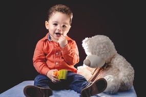 cute boy and teddy bear