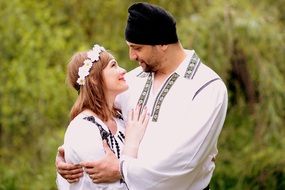 family in Romanian traditional costumes