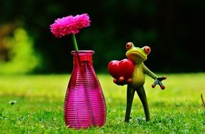 cute green toy frog