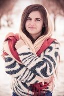 girl in a bright sweater on a winter day