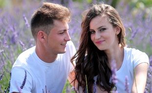 happy couple of lovers in lavender field