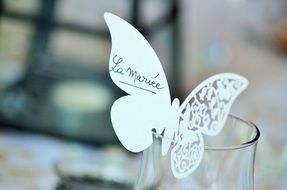 white butterfly on glass, wedding decoration