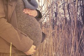pregnant woman on a cold day