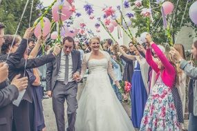 procession of happy bride and groom