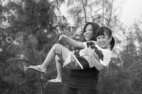 mother and daughter dare black white photo