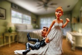 comic figure of newlyweds