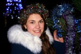 girl with christmas decorations on her head