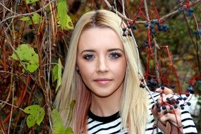 Portrait of Blond long haired young girl outdoor at autumn