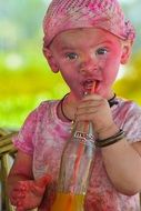 funny baby in pink powder