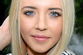 smiling girl with blue eyes close up