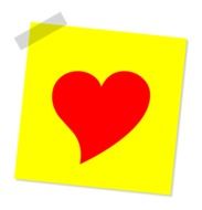 red heart on the yellow sticky note