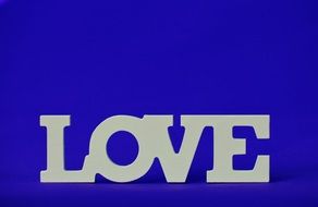 love inscription on the indigo background