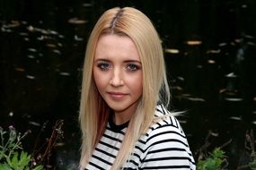 girl with blue eyes near the lake